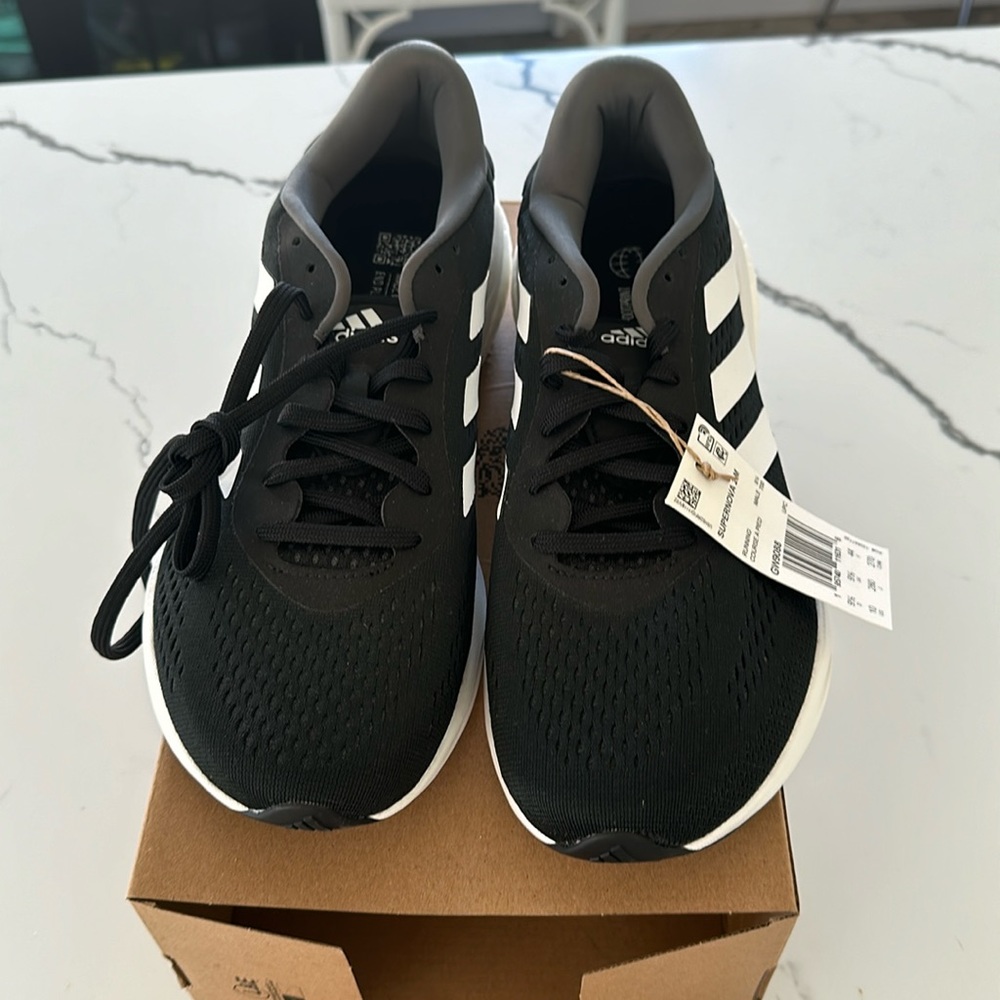 I am selling these black supernova shoes fresh out the box.